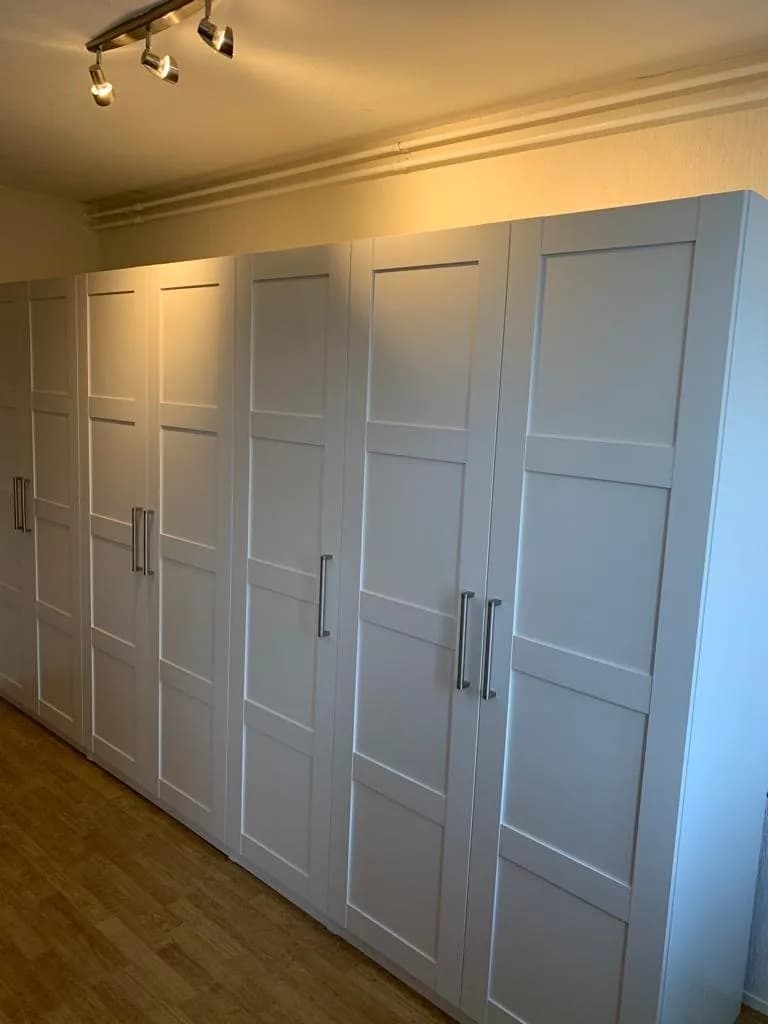 Hülsta wandsysteem in een ingerichte woonkamer, gemonteerd volgens fabrikantenmanual